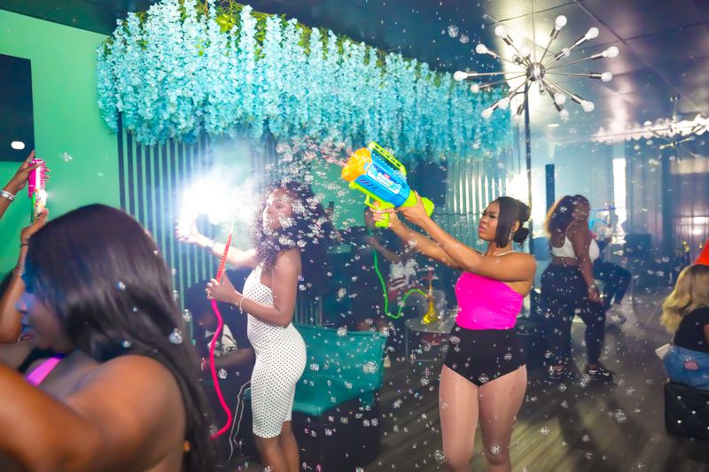 The champagne spray going up